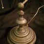 Base detail of the Raffaello ministerial lamp in antique brass