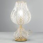 Table lamp with sinuous lines in Venetian blown glass
